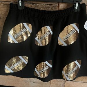 ✨Queen of Sparkles ✨
Black and Gold football Sequin Skirt-size M NWT